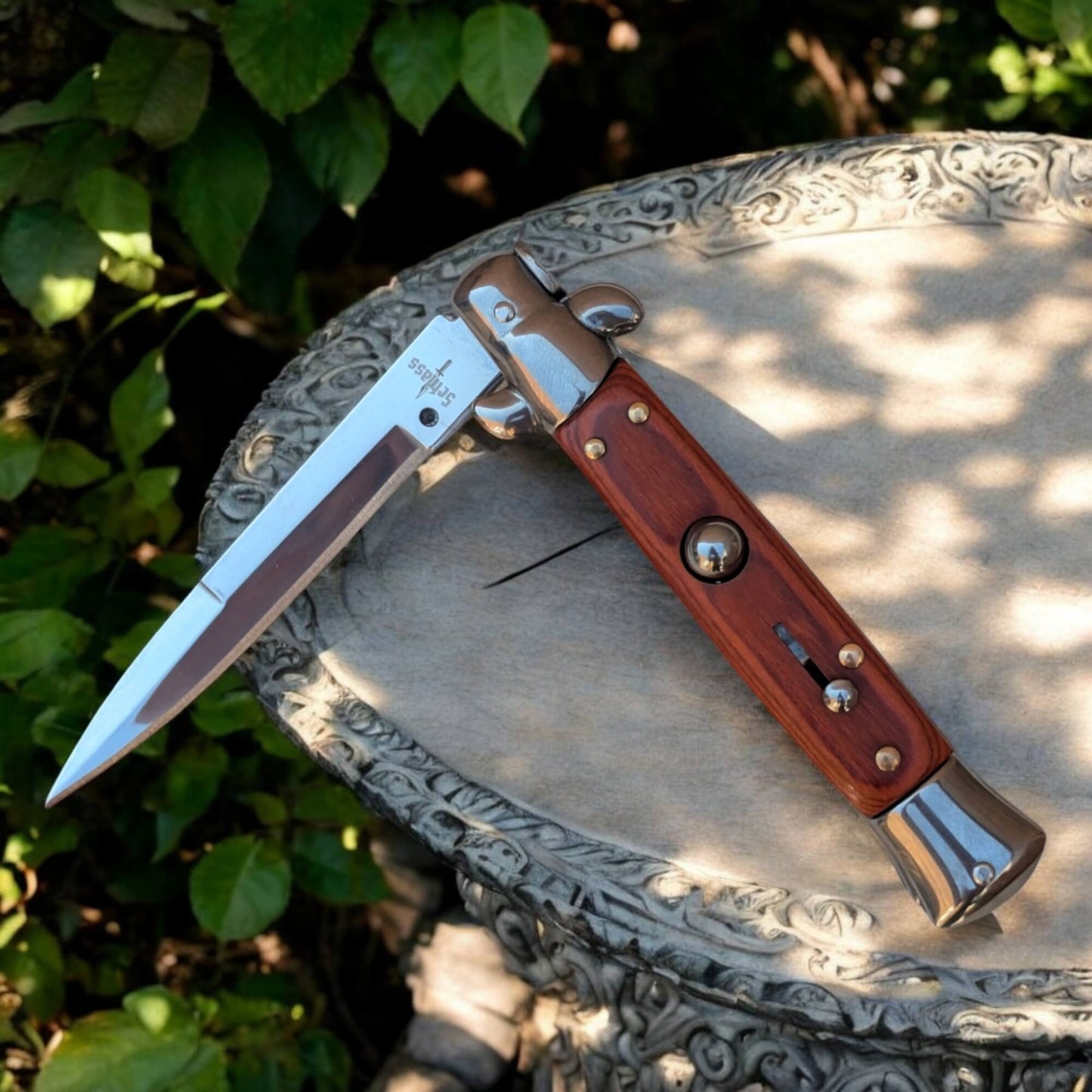 Couteau de poche à cran d'arrêt ouverture automatique type stiletto marron argent Schlass