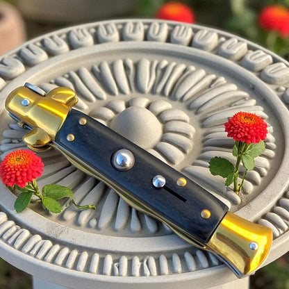 Couteau automatique original à cran d'arrêt noir doré lame serpentine idée cadeau unique pour homme 