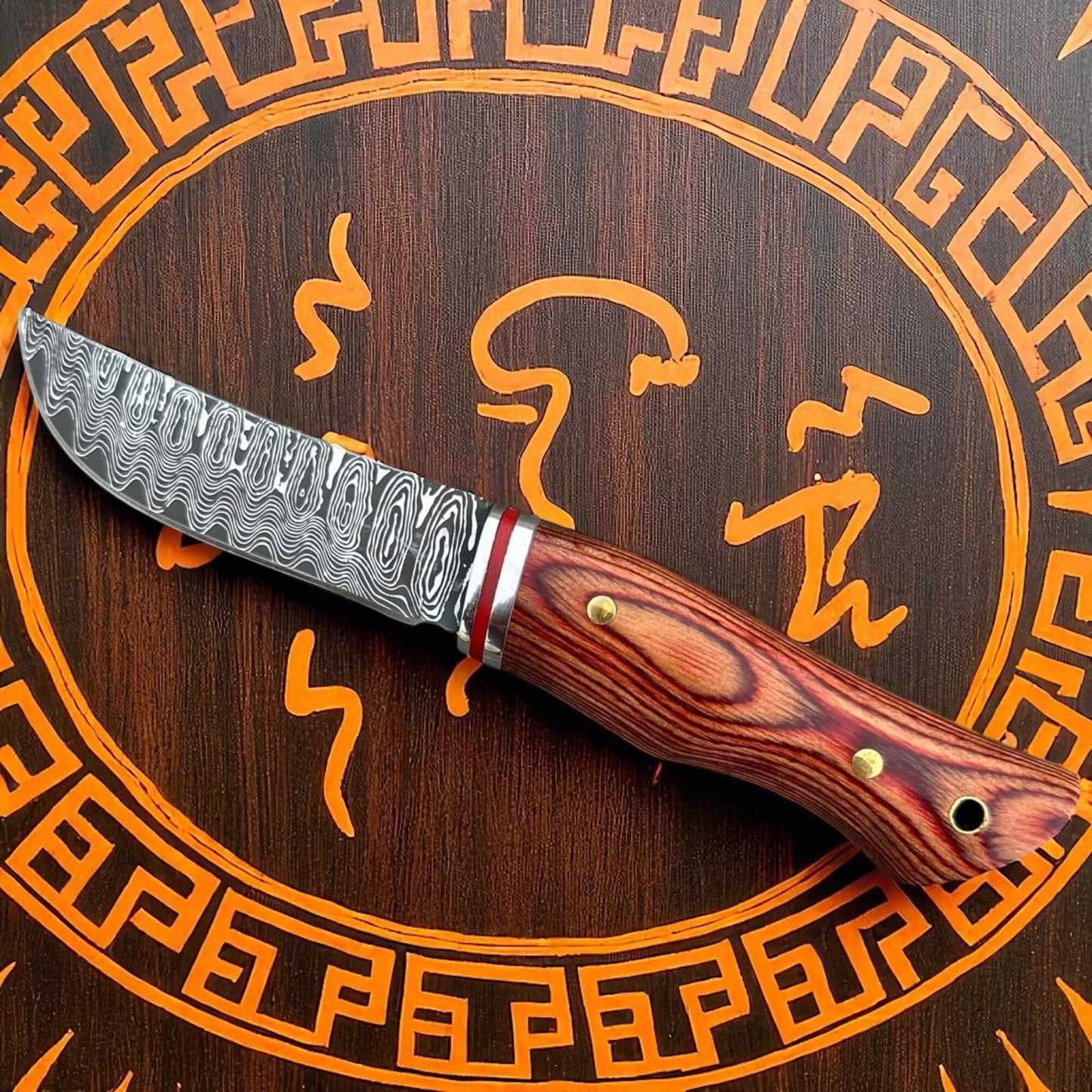 Couteau de poche bois et acier damas idéal pour la chasse