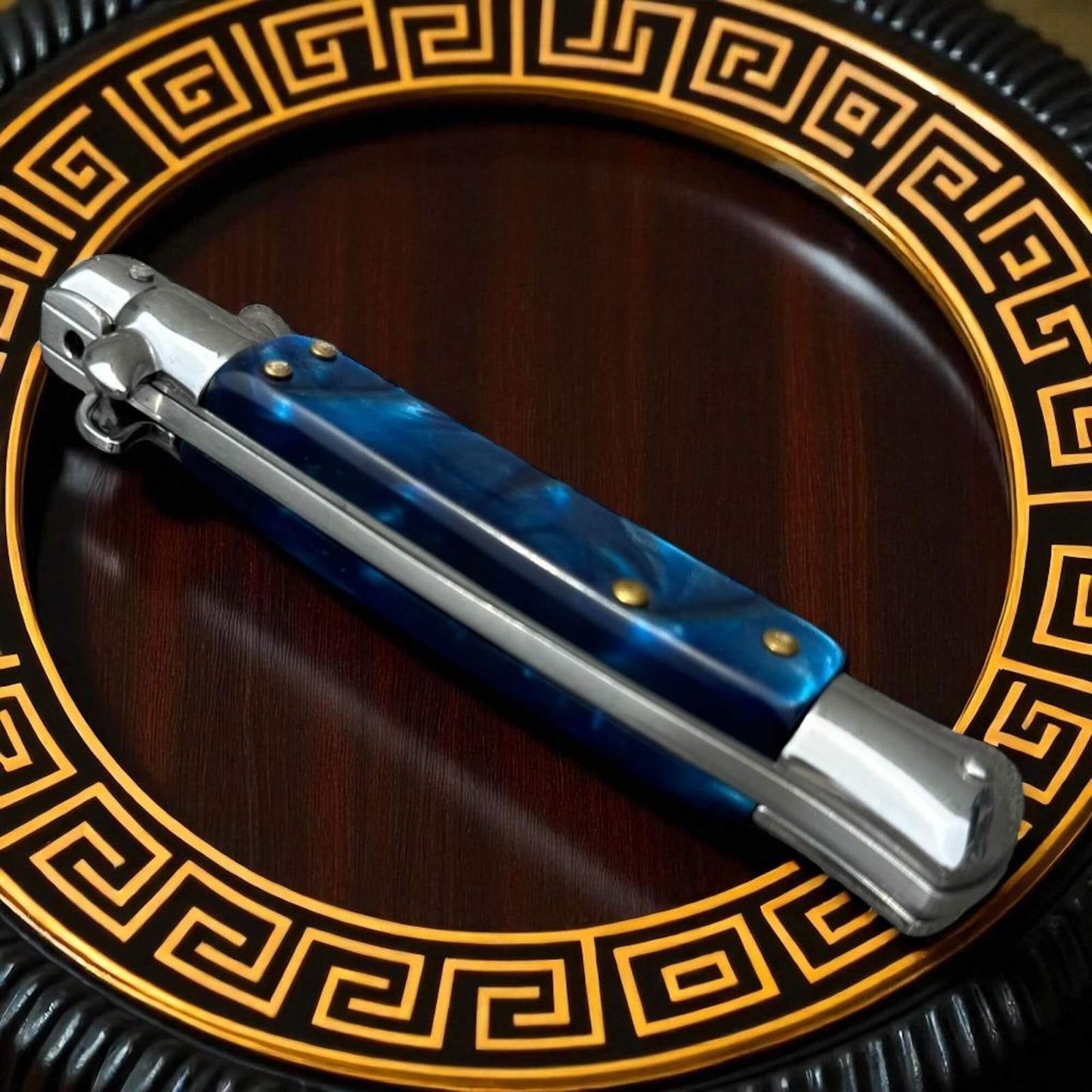 Couteau de poche de la marque Schlass ouverture automatique bleu/argent 